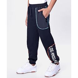 Pine Kids Cotton Knit Full Length Lounge Pant with Text Print & Pipe Detailing - Black