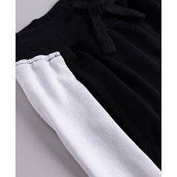 Pine Kids Knit Full Length Track Pant with Cut & Sew Design & Text Print - Black